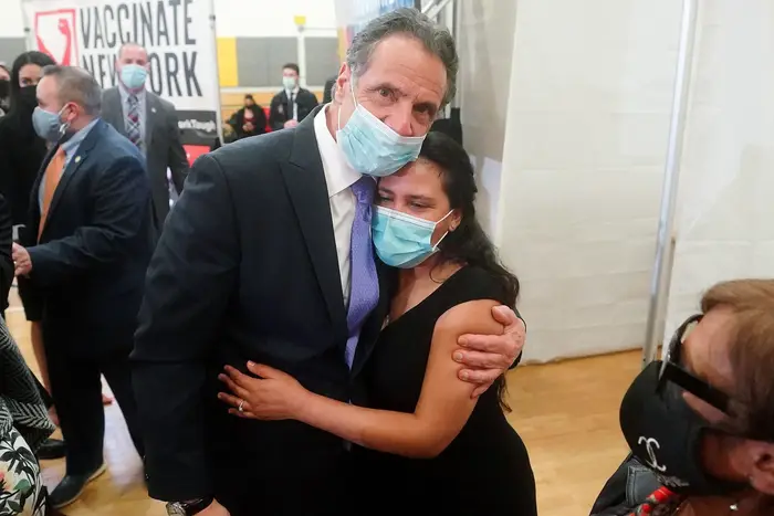 Gov. Cuomo hugs a supporter as he departs an event in the Bronx on March 26th, 2021.